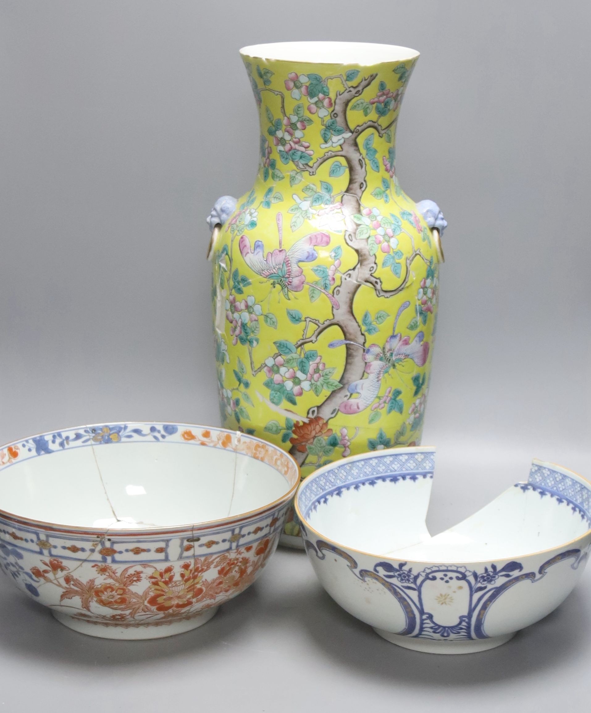 A large 19th century Chinese yellow ground vase and two 18th century Chinese porcelain bowls, diameter 26cm (a.f)